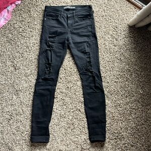 Women’s distressed Express jeans